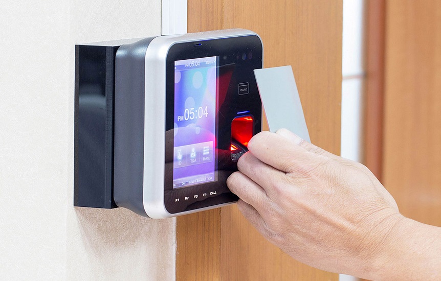 Red access control panel installed in a corporate building in Riyadh